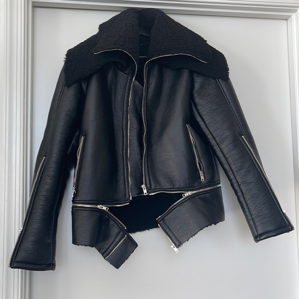 New! Black multi zipper moto jacket! Removable bottom zipper to make shorter!